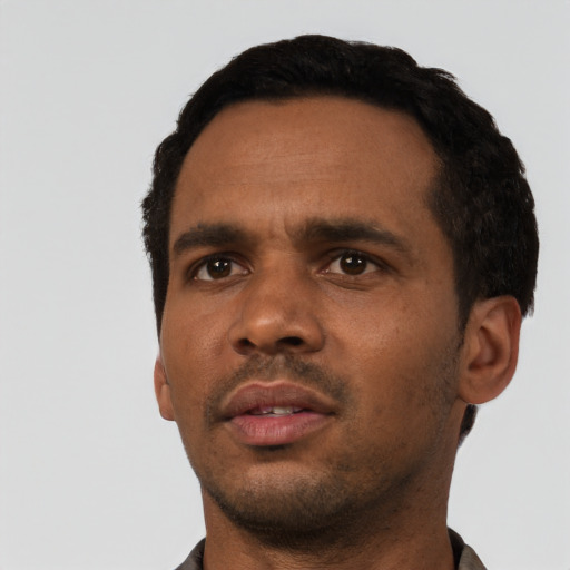 Neutral black young-adult male with short  black hair and brown eyes