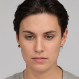 Neutral white young-adult female with short  brown hair and brown eyes