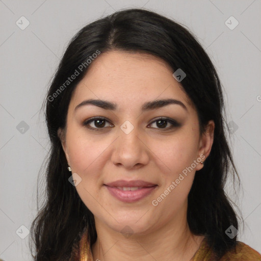 Joyful latino young-adult female with long  brown hair and brown eyes