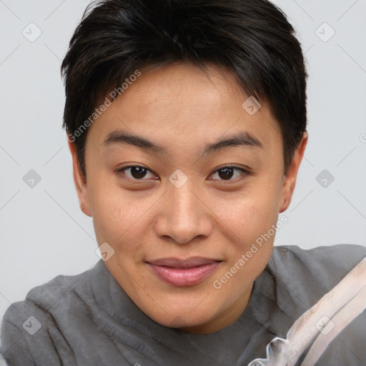 Joyful asian young-adult female with short  brown hair and brown eyes