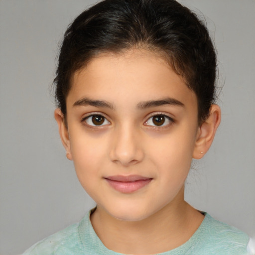 Joyful white child female with medium  brown hair and brown eyes