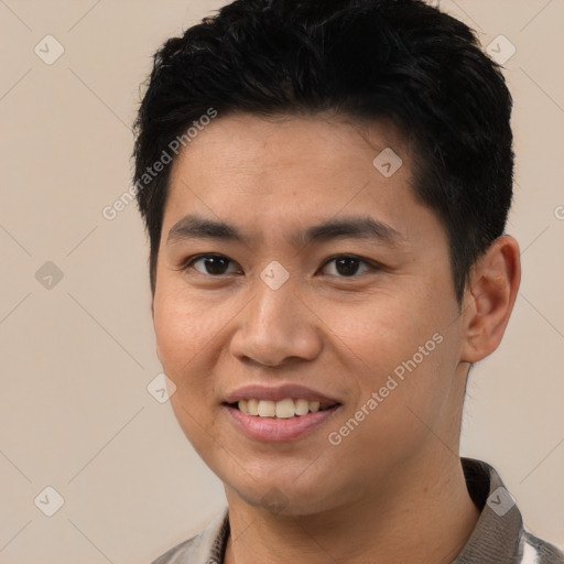 Joyful white young-adult male with short  black hair and brown eyes