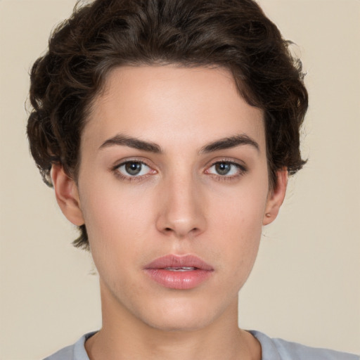 Neutral white young-adult female with short  brown hair and brown eyes