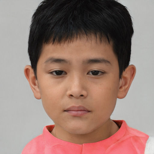 Neutral asian child male with short  brown hair and brown eyes