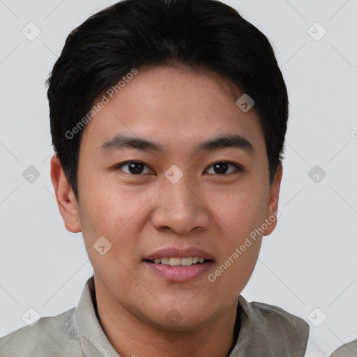 Joyful asian young-adult male with short  black hair and brown eyes