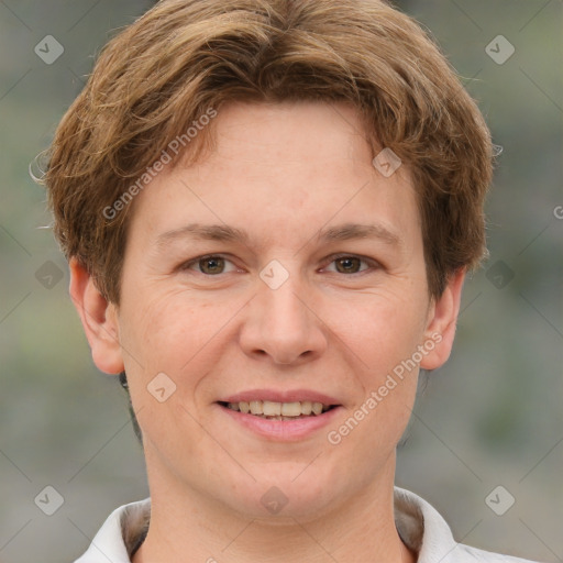 Joyful white adult female with short  brown hair and grey eyes