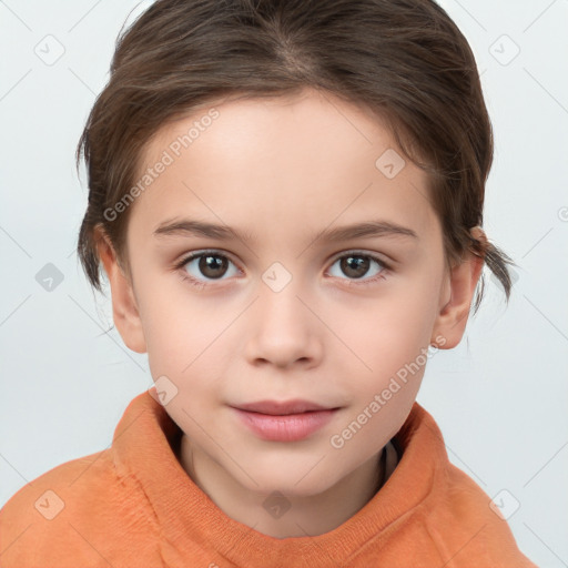 Joyful white child female with medium  brown hair and brown eyes