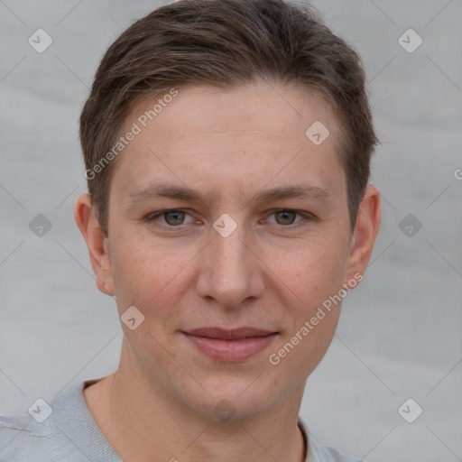 Joyful white young-adult female with short  brown hair and grey eyes