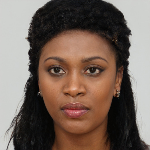 Neutral black young-adult female with long  black hair and brown eyes
