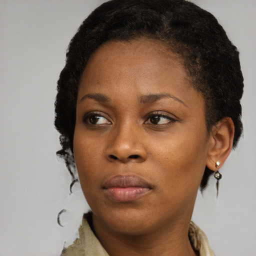 Neutral black young-adult female with short  brown hair and brown eyes