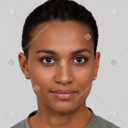 Joyful black young-adult female with short  brown hair and brown eyes