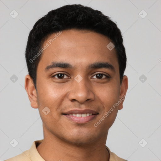 Joyful latino young-adult male with short  black hair and brown eyes