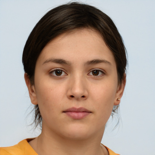Neutral white young-adult female with medium  brown hair and brown eyes