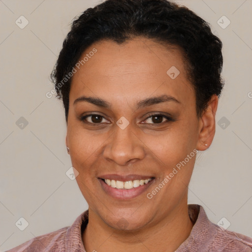 Joyful latino young-adult female with short  black hair and brown eyes