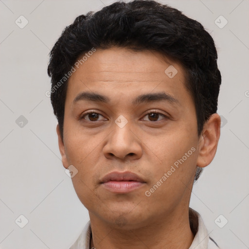 Neutral latino young-adult male with short  black hair and brown eyes