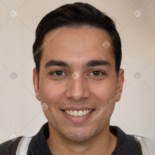 Joyful white young-adult male with short  black hair and brown eyes