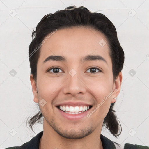 Joyful white young-adult male with short  black hair and brown eyes