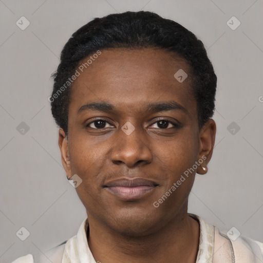 Joyful black young-adult male with short  black hair and brown eyes