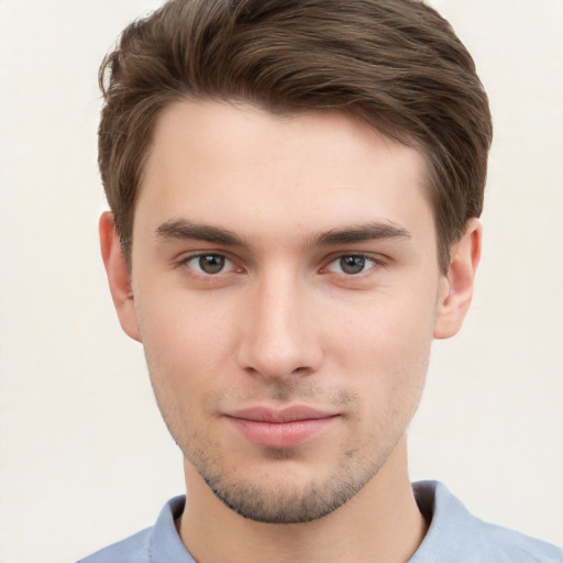 Neutral white young-adult male with short  brown hair and brown eyes