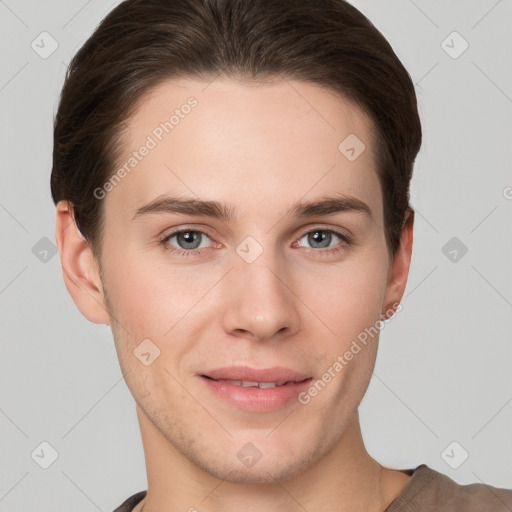 Joyful white young-adult female with short  brown hair and grey eyes