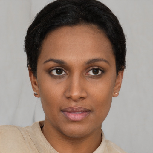 Neutral latino young-adult female with short  brown hair and brown eyes