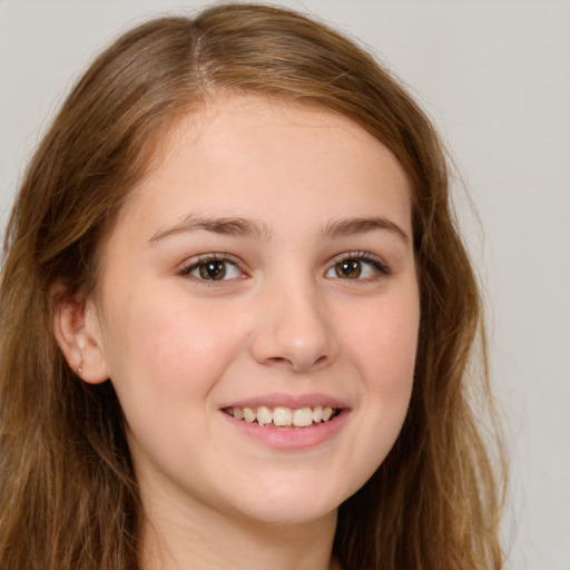 Joyful white young-adult female with long  brown hair and green eyes