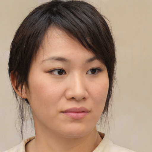 Neutral asian young-adult female with medium  brown hair and brown eyes