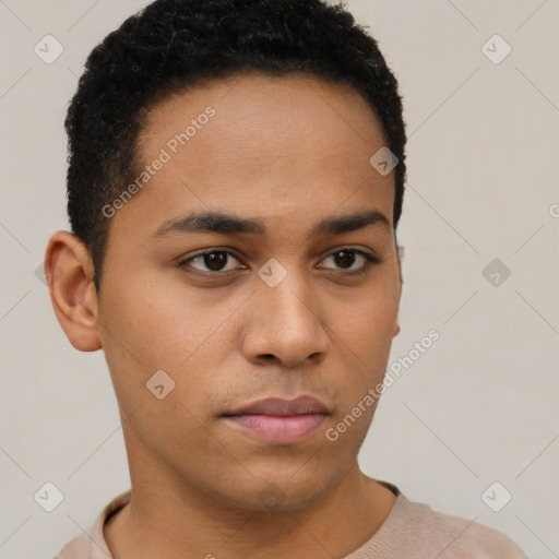 Neutral latino young-adult male with short  brown hair and brown eyes