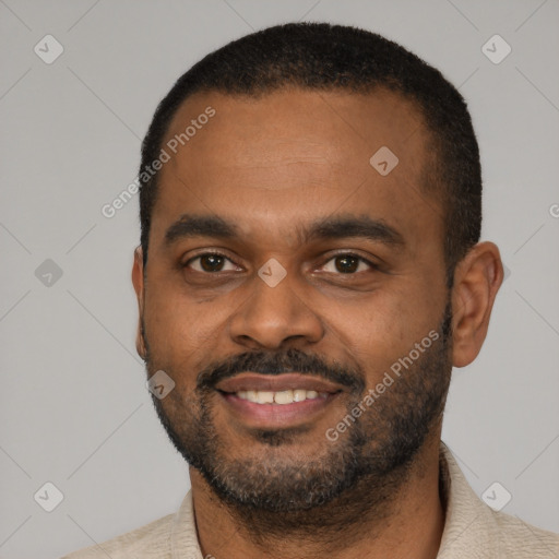 Joyful black young-adult male with short  black hair and brown eyes