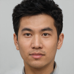 Neutral asian young-adult male with short  black hair and brown eyes