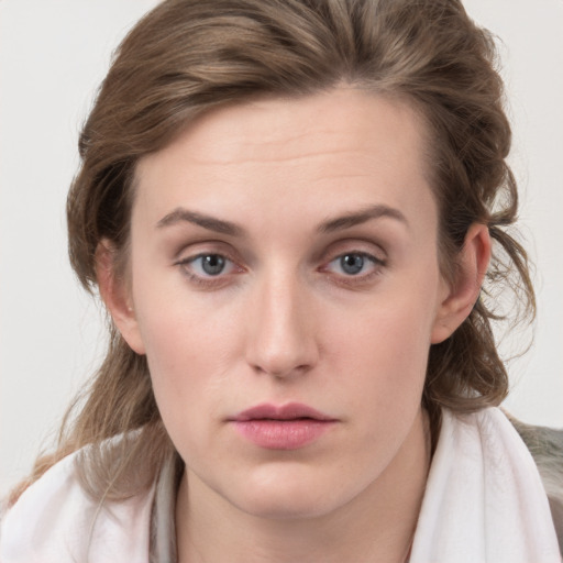 Neutral white young-adult female with medium  brown hair and grey eyes