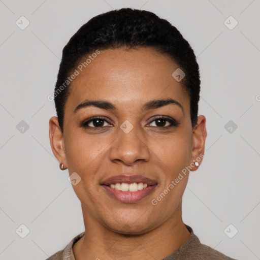 Joyful latino young-adult female with short  black hair and brown eyes