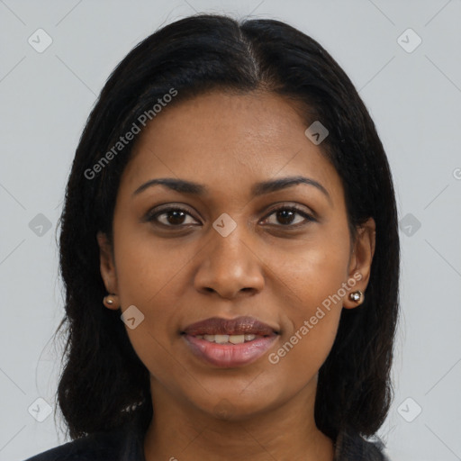 Joyful latino young-adult female with long  brown hair and brown eyes