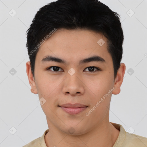 Joyful asian young-adult male with short  black hair and brown eyes