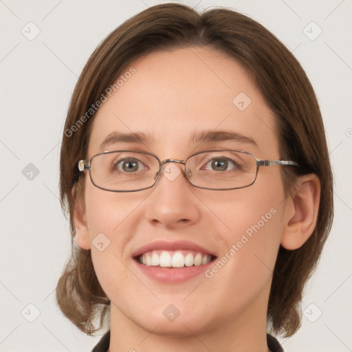 Joyful white young-adult female with medium  brown hair and green eyes