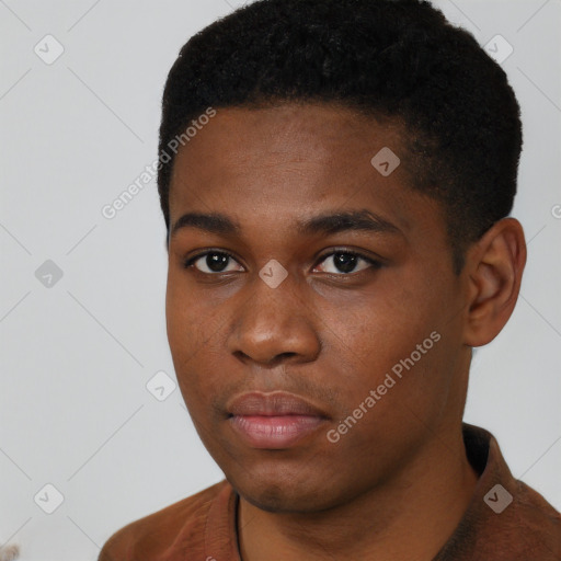Neutral black young-adult male with short  black hair and brown eyes