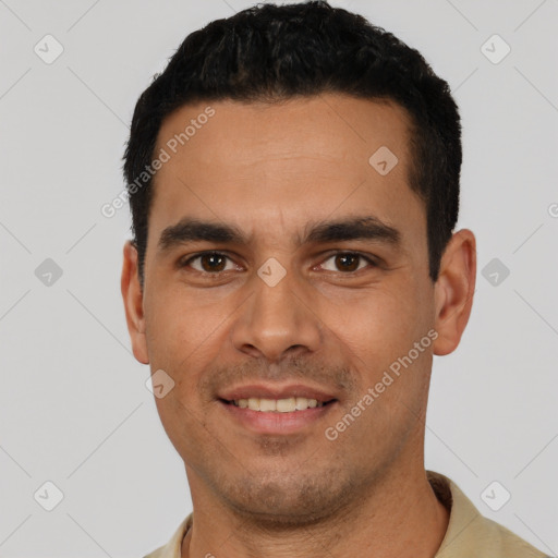 Joyful white young-adult male with short  black hair and brown eyes