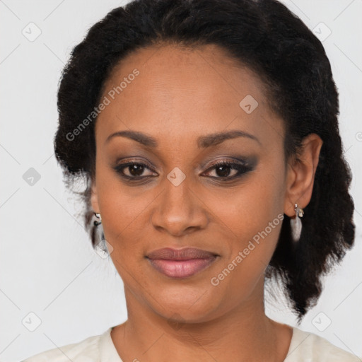 Joyful black adult female with short  brown hair and brown eyes