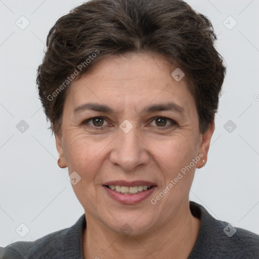 Joyful white adult female with short  brown hair and brown eyes