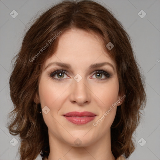 Joyful white young-adult female with medium  brown hair and green eyes