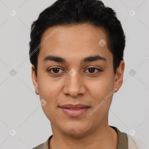 Joyful latino young-adult male with short  black hair and brown eyes