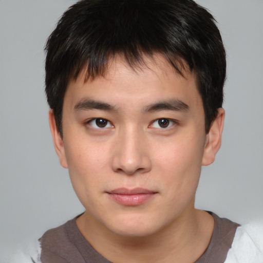 Neutral asian young-adult male with short  brown hair and brown eyes