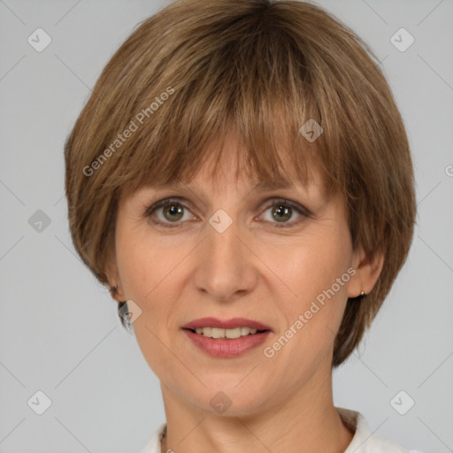 Joyful white adult female with medium  brown hair and grey eyes