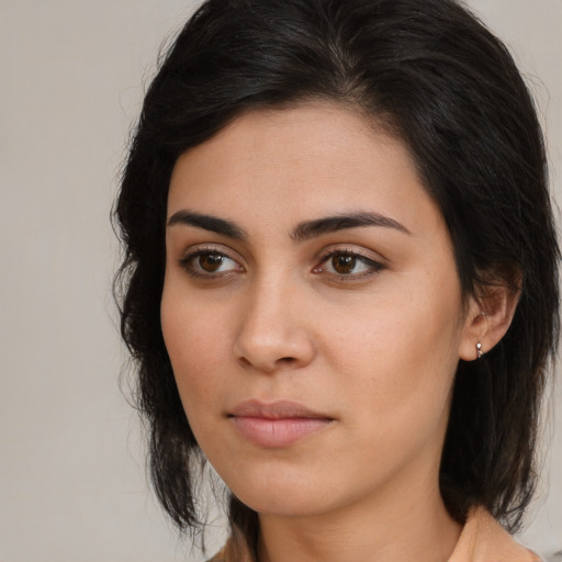 Neutral asian young-adult female with medium  brown hair and brown eyes