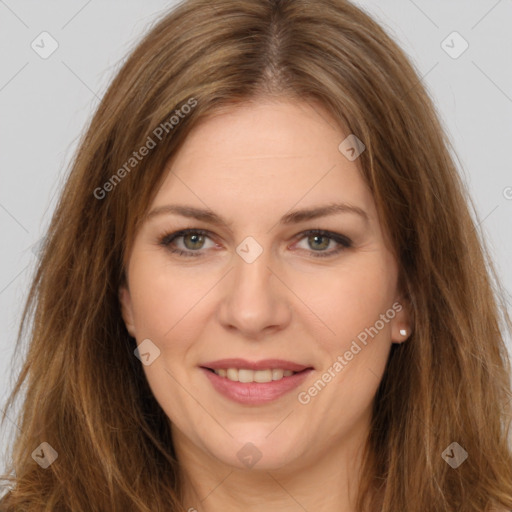 Joyful white young-adult female with long  brown hair and brown eyes