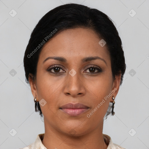 Joyful latino young-adult female with short  brown hair and brown eyes