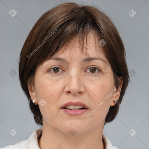 Joyful white adult female with medium  brown hair and brown eyes