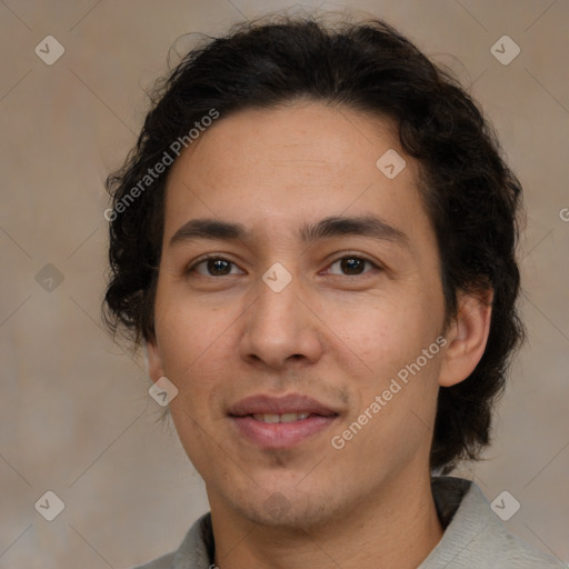 Joyful white adult male with medium  brown hair and brown eyes