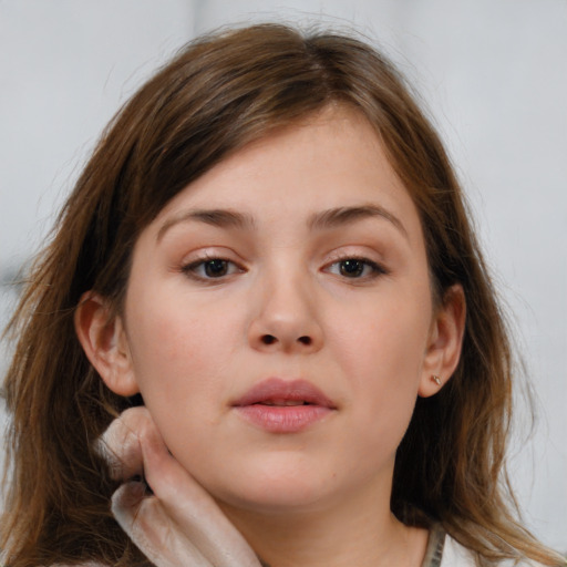 Neutral white child female with medium  brown hair and brown eyes