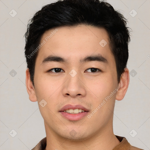 Joyful white young-adult male with short  black hair and brown eyes